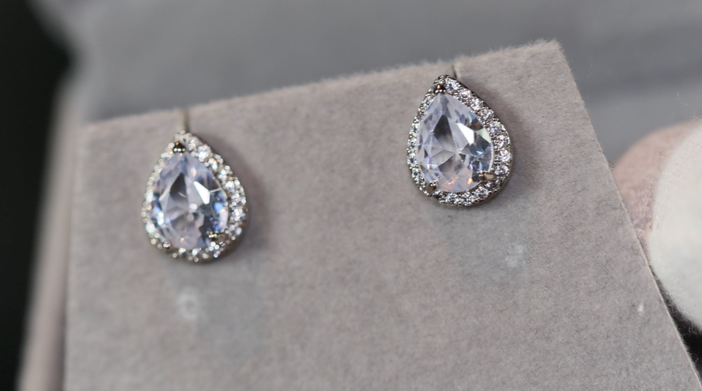 Pear cut diamond ear studs