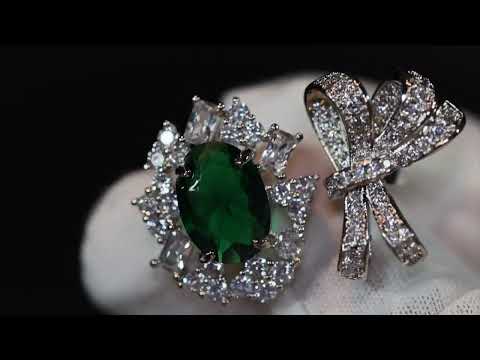 Green diamond ribbon ring