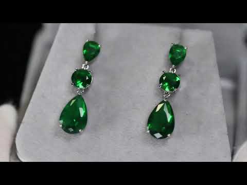 Load and play video in Gallery viewer, Green Pear Cut Diamond Earrings