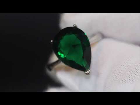 Green pear cut diamond ring