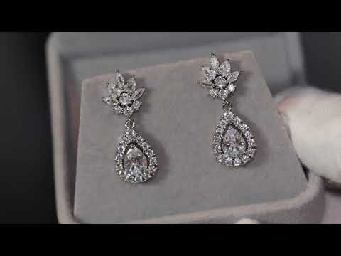 Load and play video in Gallery viewer, Pear cut diamond earrings