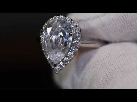 Load and play video in Gallery viewer, Pear cut diamond ring