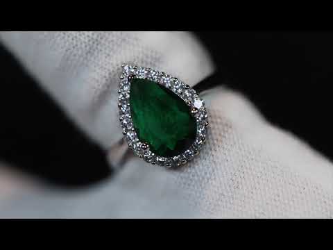 Load and play video in Gallery viewer, Green pear cut diamond ring