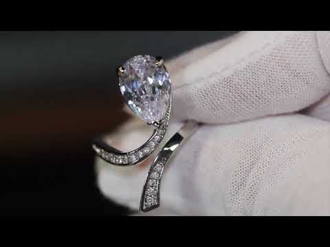 Load and play video in Gallery viewer, Pear cut diamond ring