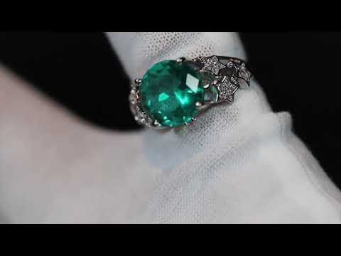 Big green diamond ring