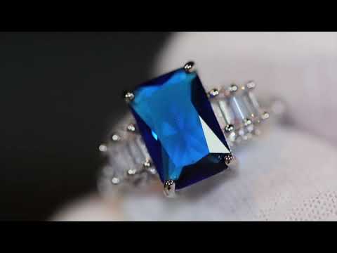 Load and play video in Gallery viewer, womens blue rectangle diamond ring