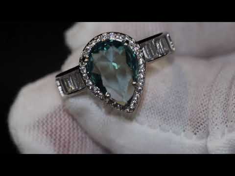 Load and play video in Gallery viewer, Teal blue teardrop diamond ring