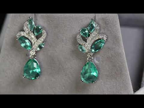 Load and play video in Gallery viewer, Green Pear Cut Diamond Earrings