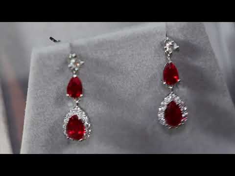 Load and play video in Gallery viewer, Red Pear Cut Diamond Earrings