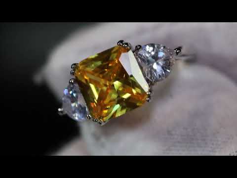 Load and play video in Gallery viewer, Three stone yellow diamond ring