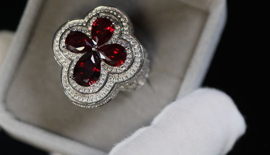 Silver ring with red gemstones