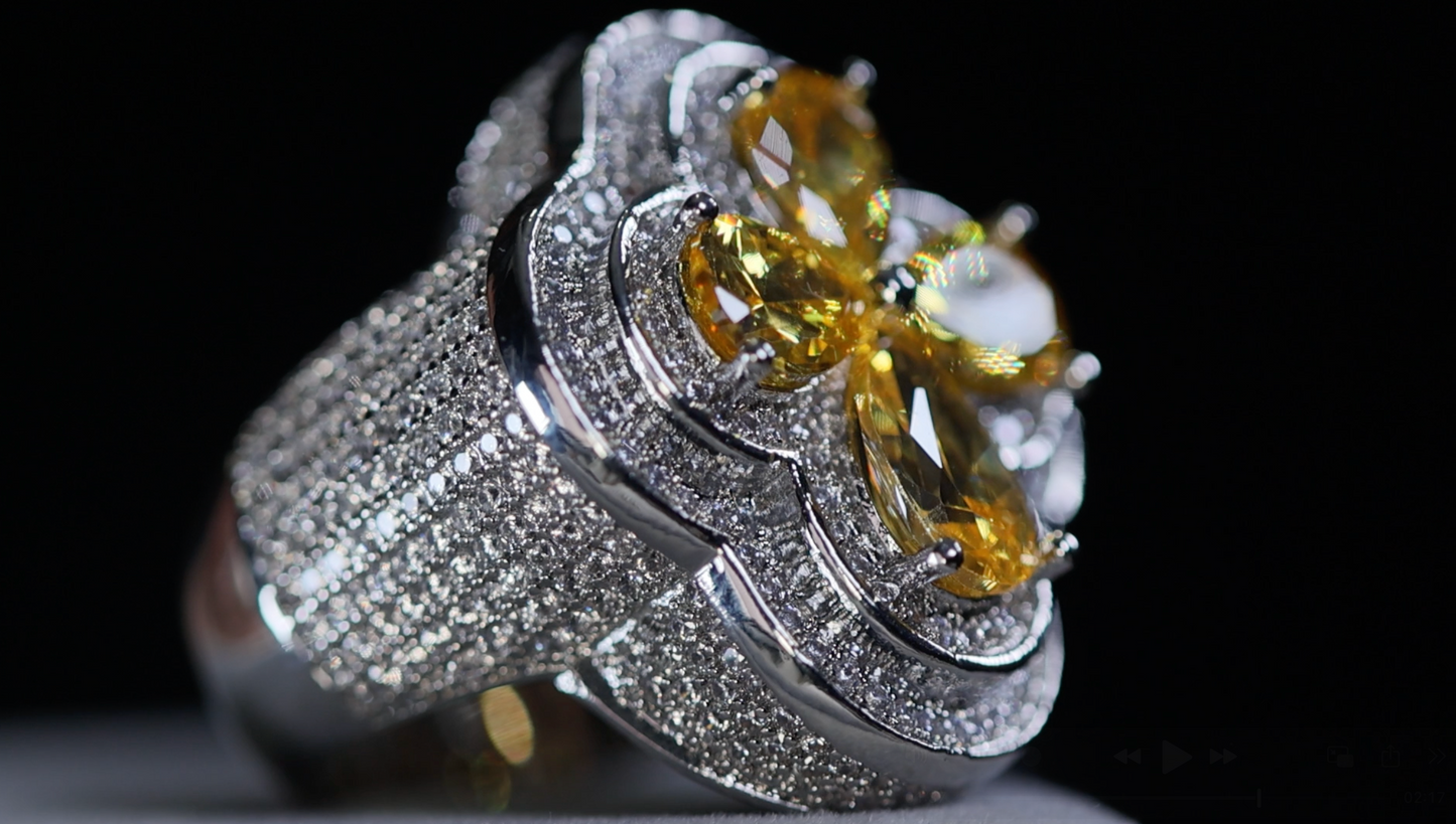 Silver ring with yellow gemstones