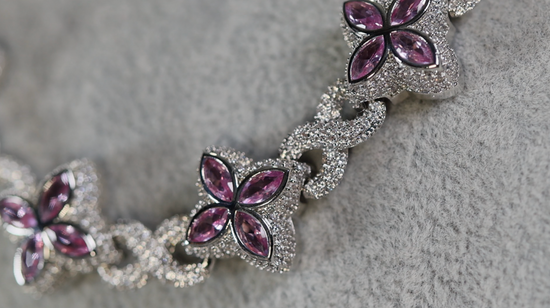 Silver necklace with purple gemstones