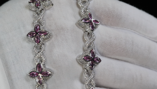Silver necklace with purple diamonds