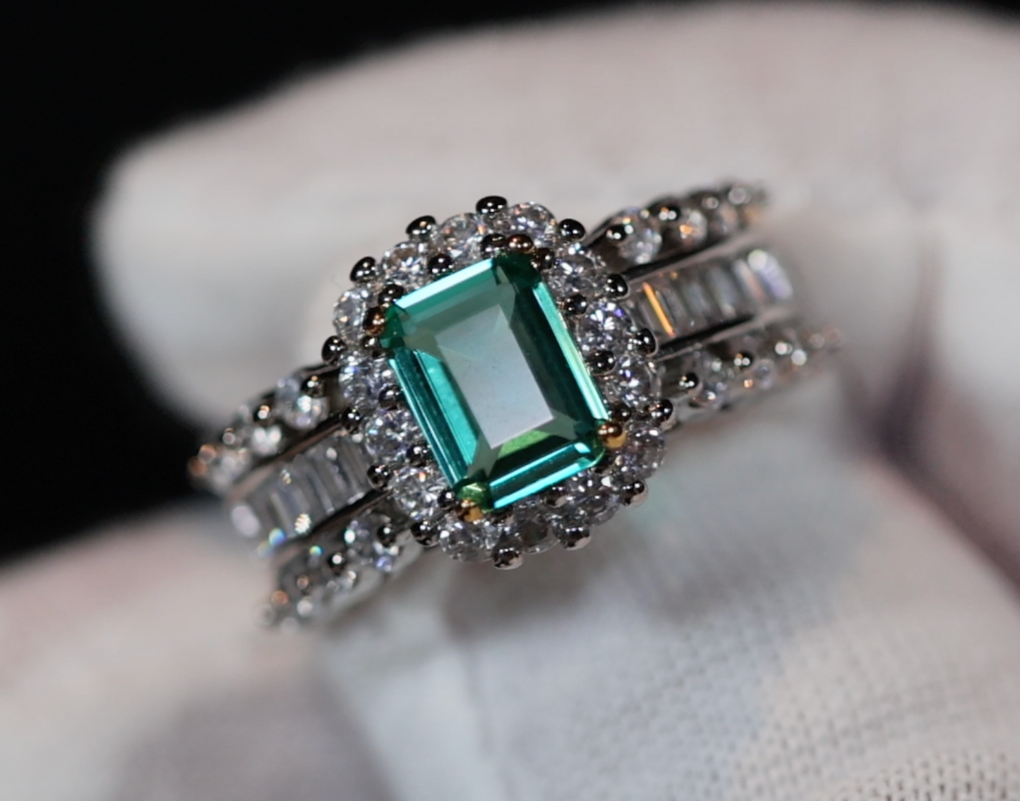 Emerald cut green diamond ring