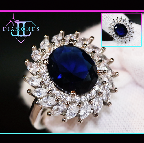 oval sapphire blue diamond engagement ring