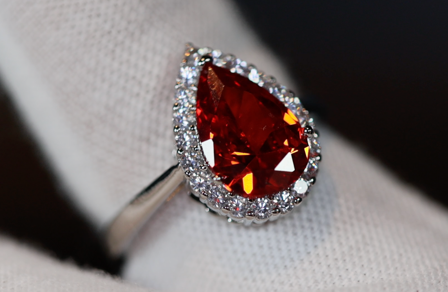 red pear cut diamond ring