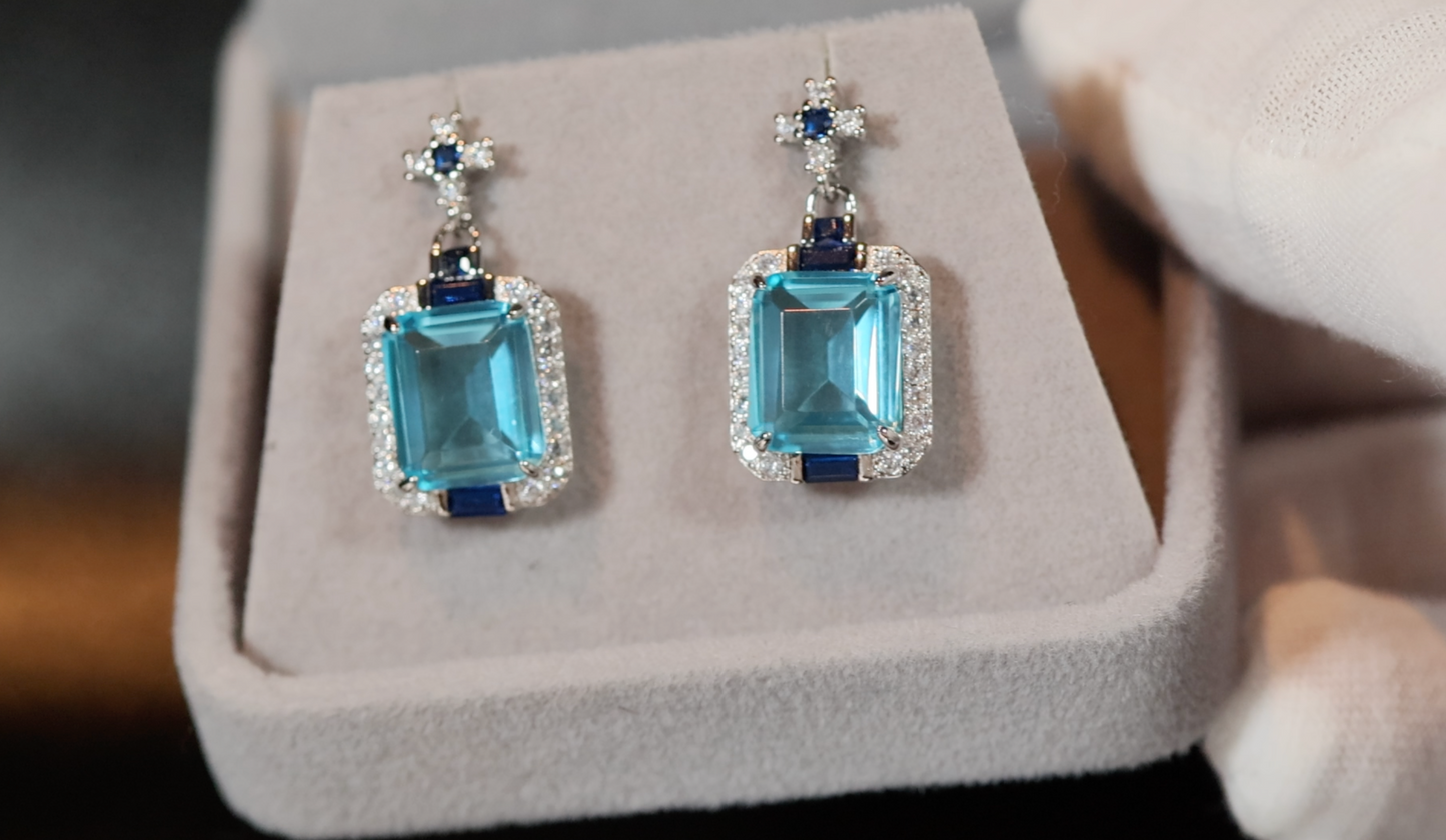 Womens big blue diamond earrings, Blue diamond earrings, Blue emerald cut diamond earrings