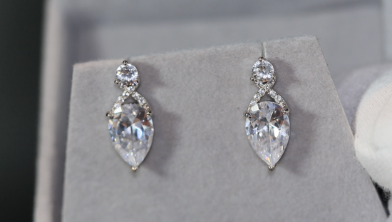 Pear cut diamond ear studs