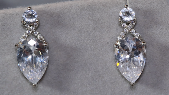 Pear cut diamond ear studs