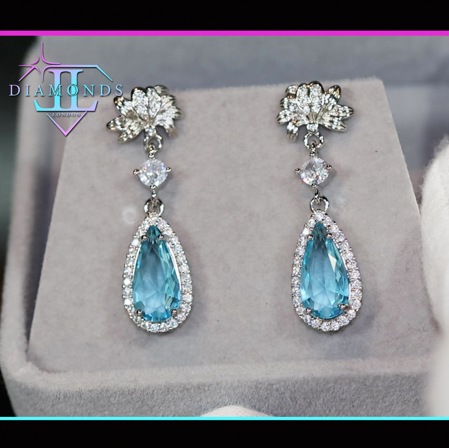 blue pear cut diamond earrings