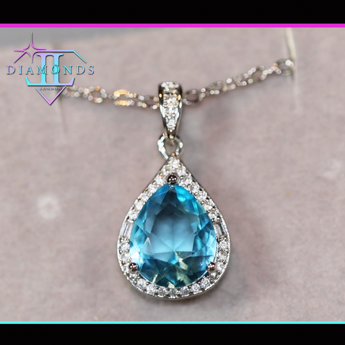 Blue pear cut diamond pendant