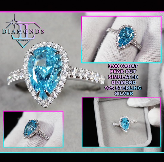 Pear cut blue diamond ring