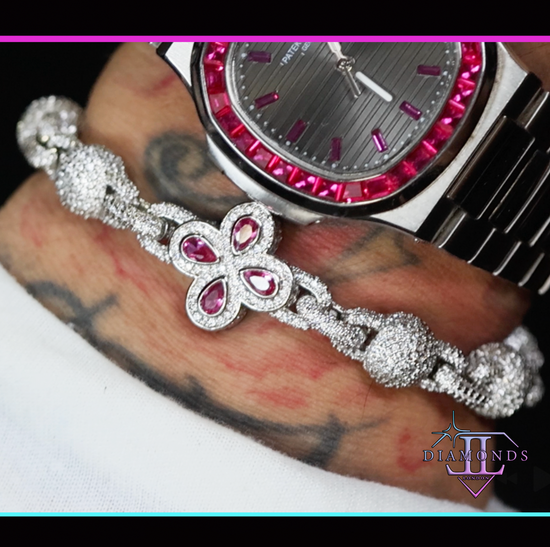 Silver bracelet with pink gemstones