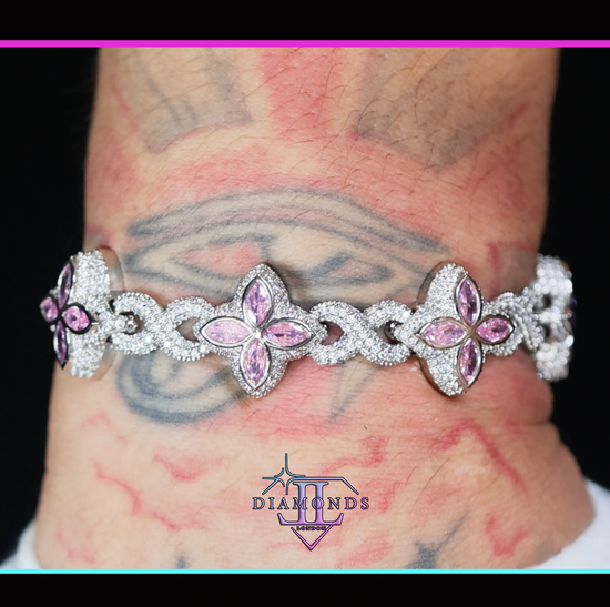 Silver bracelet with pink gemstones