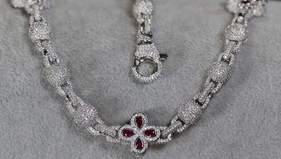 Silver necklace with red gemstones