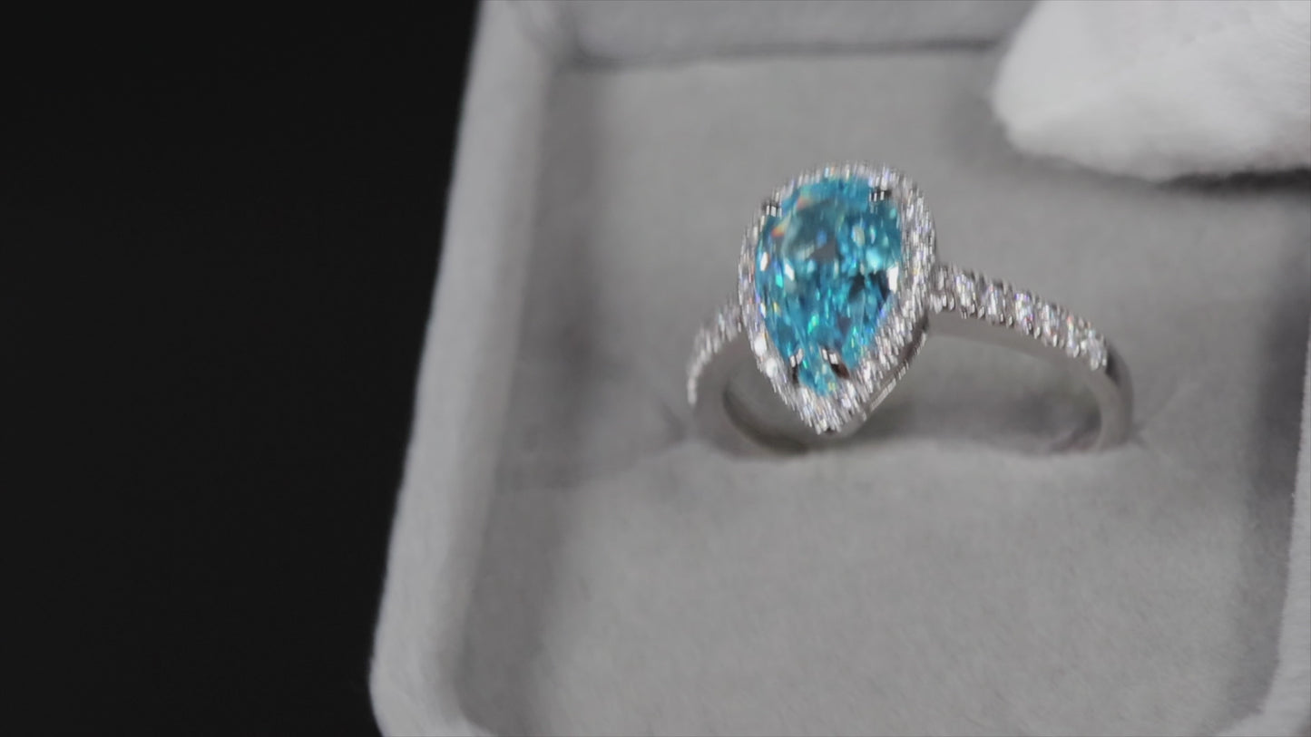 Pear cut blue diamond ring