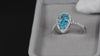 Pear cut blue diamond ring