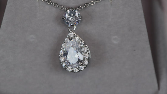 Load and play video in Gallery viewer, PEAR CUT DIAMOND PENDANT
