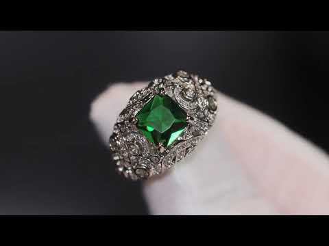 Emerald green diamond ring