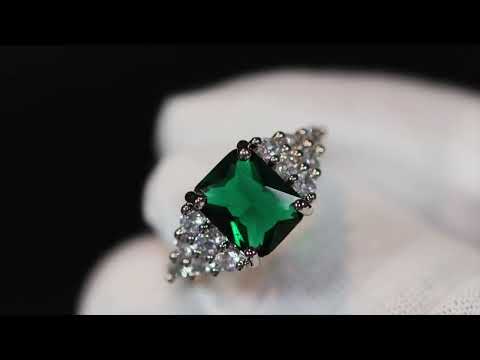 Emerald green diamond ring