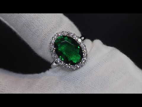 Emerald green oval diamond ring