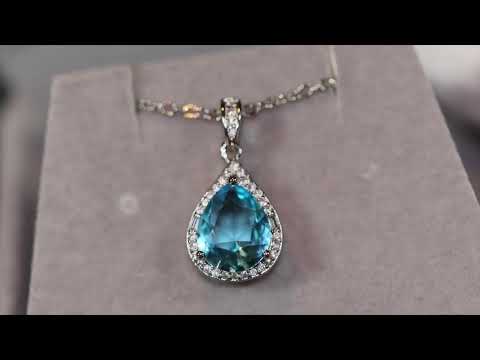 Load and play video in Gallery viewer, Blue pear cut diamond pendant
