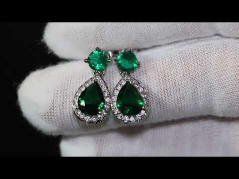 Pear cut green diamond earrings