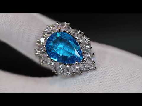 Pear cut blue diamond ring