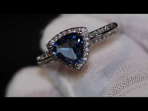 Blue trilliant diamond ring