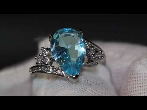 Aquamarine blue diamond engagement ring